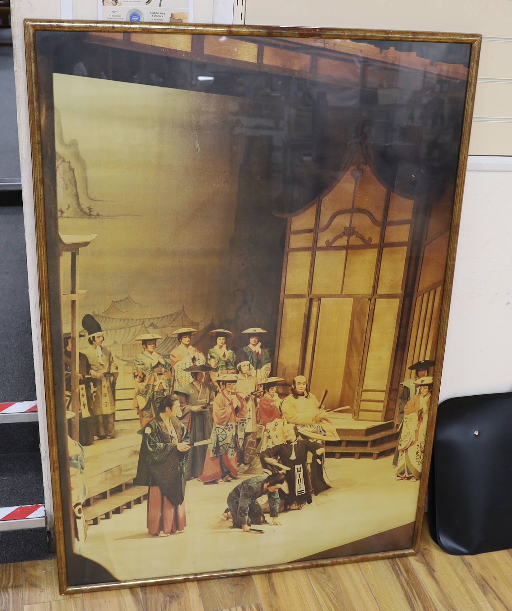 An early 20th century lithograph poster for Gilbert & Sullivan’s H.M.S. Pinafore, in an oak frame, together with a framed play bill, another framed poster, a large framed production photograph and a framed photo montage
